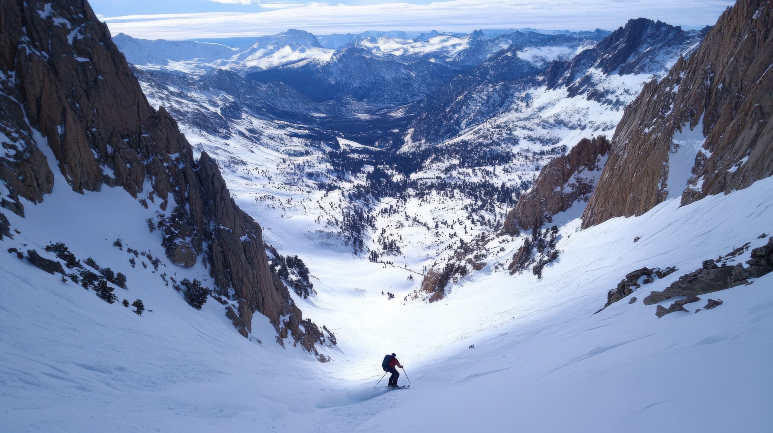 Skier on Pristine Valley Descent